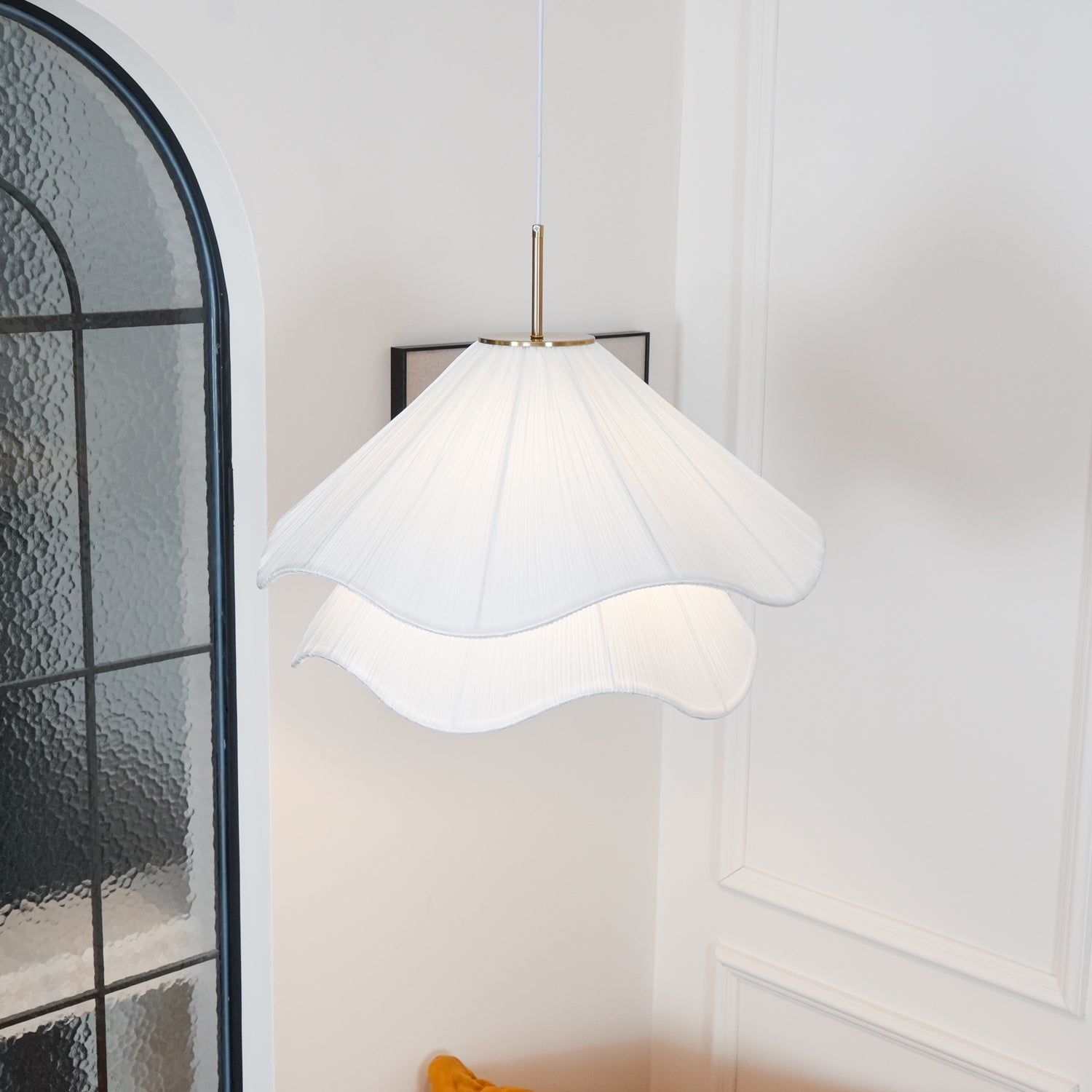 Ethereal Bloom pendant light hanging view of the pleated fabric and gold body