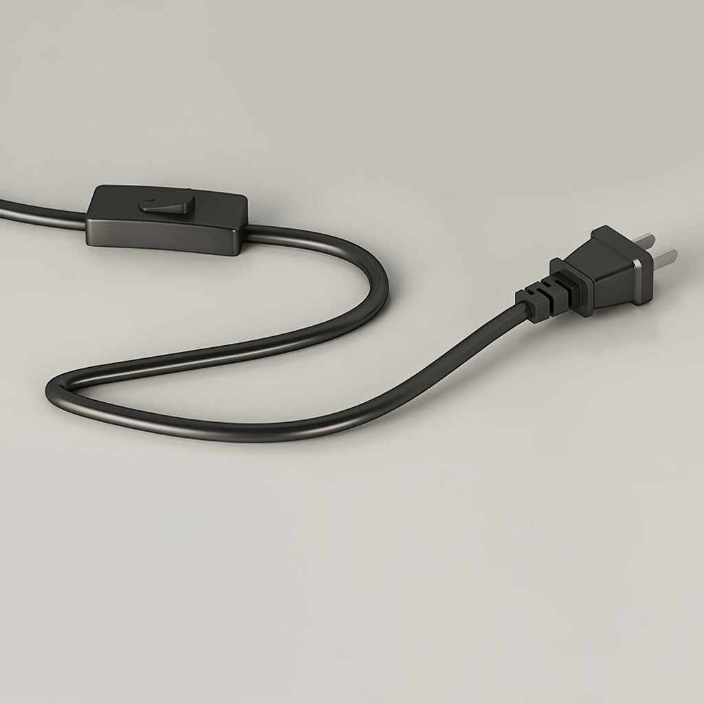Detail of the Clérachic floor lamp's fabric-covered cord with its inline on/off switch and two-pin plug, laid on a plain grey background.