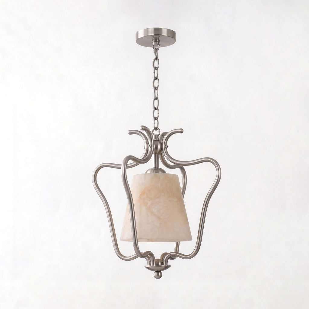Shown unlit on white, the nickel finish of this Clérachic pendant forms hand-scrolled arms around its alabaster shade.