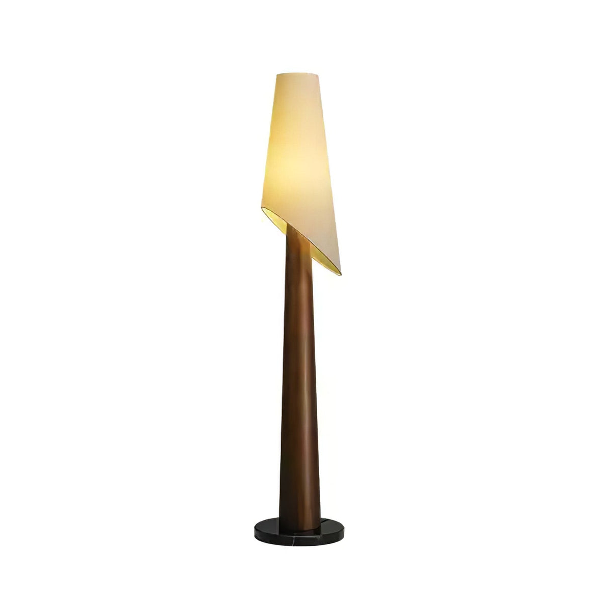 This walnut-bodied Clérachic floor lamp glows against a white background, its round base and cord visible.