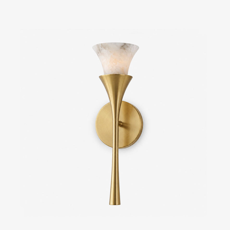 Studio shot on a bare white backdrop, this Clérachic sconce's tapered brass stem flares open to an alabaster shade.