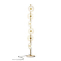 Cropped closer in studio, this Clérachic floor lamp shows its tiered acrylic discs and looping cord against plain white.