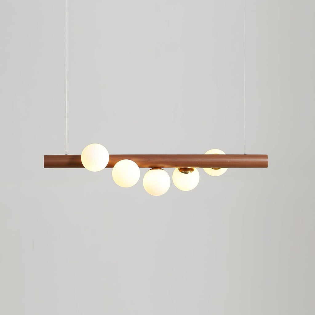 Linear wood pendant light with walnut bar and opal glass globes