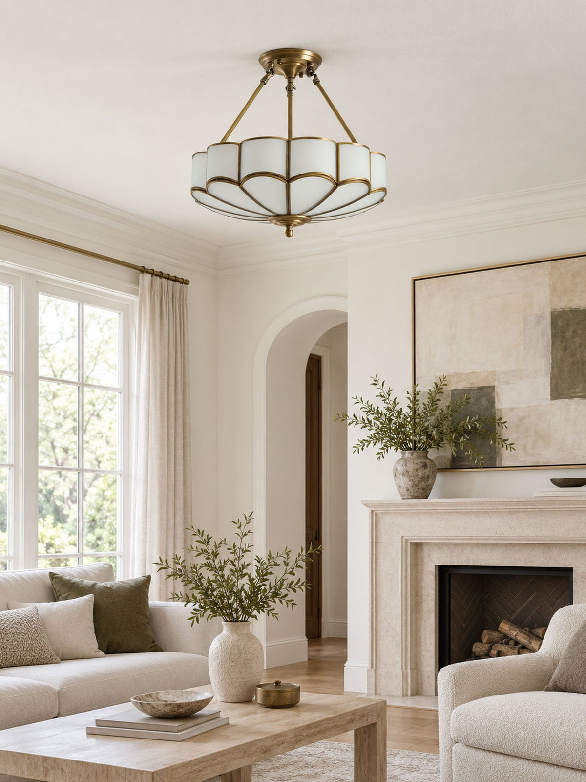 Near a stone fireplace and an arched doorway, this Clérachic ceiling light glows warm in a neutral living room.