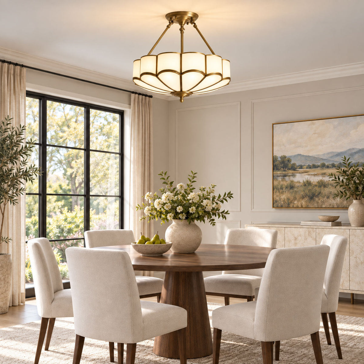 Above a round dining table by arched black-framed windows, this Clérachic ceiling light glows warm in a neutral dining room.