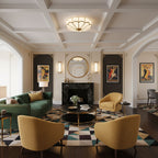Brass-framed frosted glass ceiling light on white background