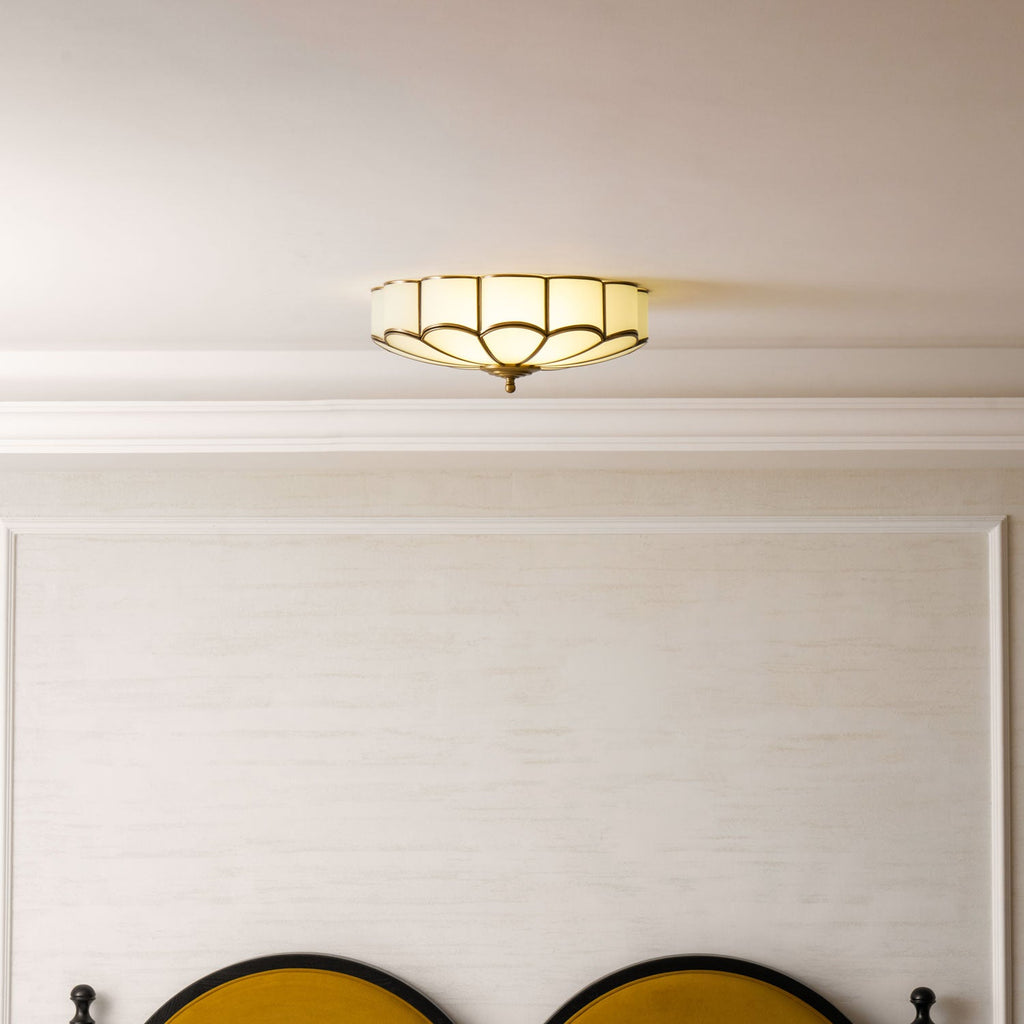Flower-shaped glass ceiling light with warm ambient glow