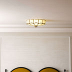 Flower-shaped glass ceiling light with warm ambient glow