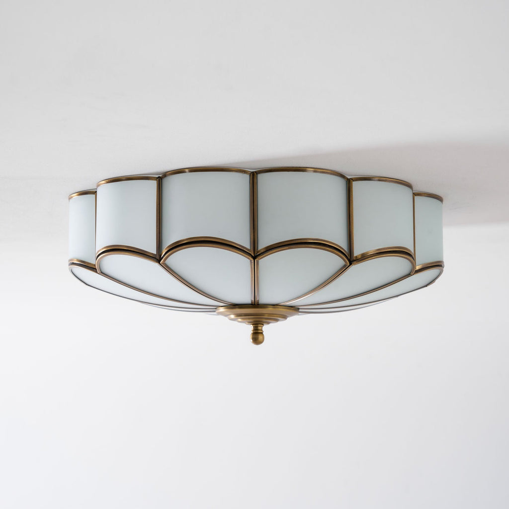 Flower-shaped brass ceiling light with soft frosted glow