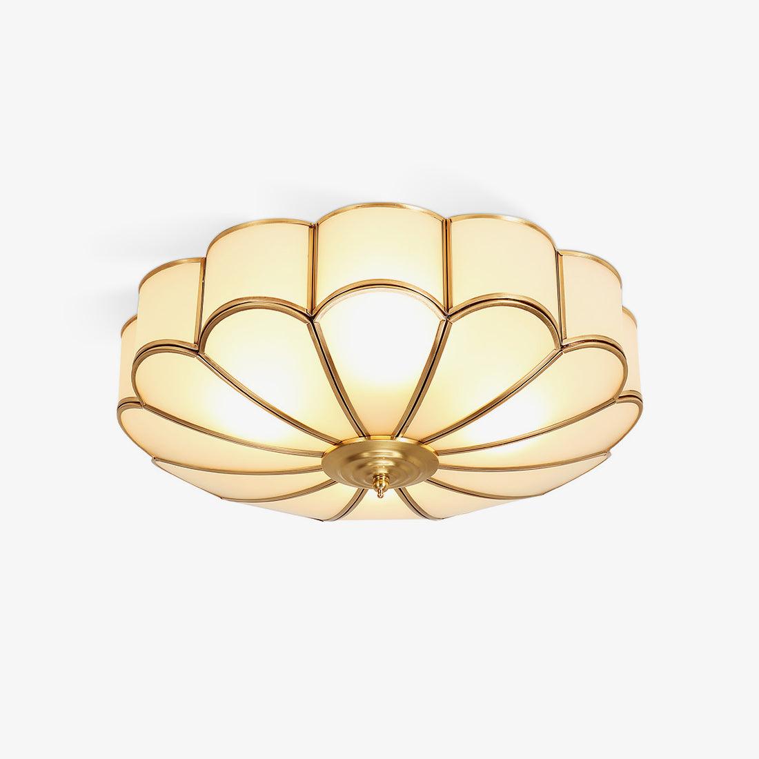 Flower-shaped ceiling light with frosted glass shades and brass frame