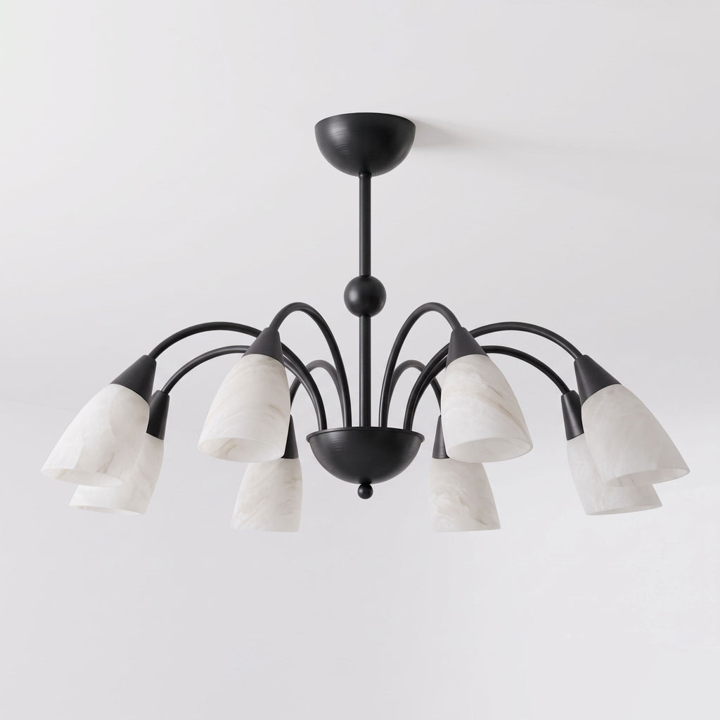 On a white background, the matte black finish of this Clérachic chandelier contrasts with its pale alabaster shades.