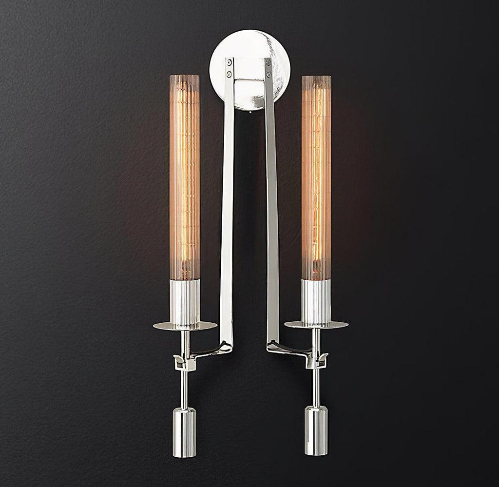 Brass wall sconce detail showing ribbed glass cylinder