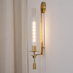Brass wall lamp close up showing ribbed glass texture