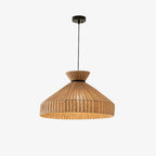 Product view of this Clérachic pendant from its black ceiling mount, the cord leading down to the flared jute cone.
