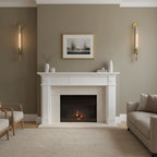 Brass wall lamp with ribbed glass mounted in a hallway