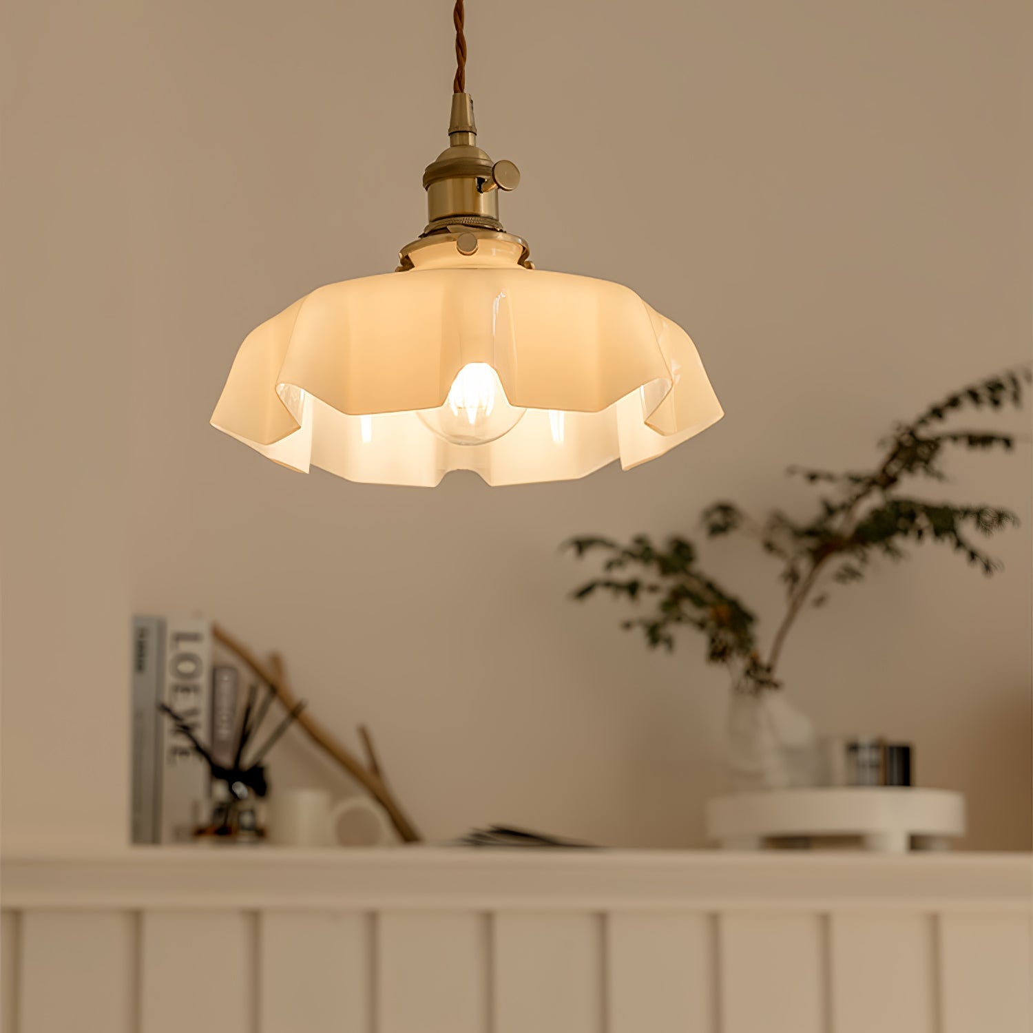 French Flower pendant light with bloom shade in a dining nook