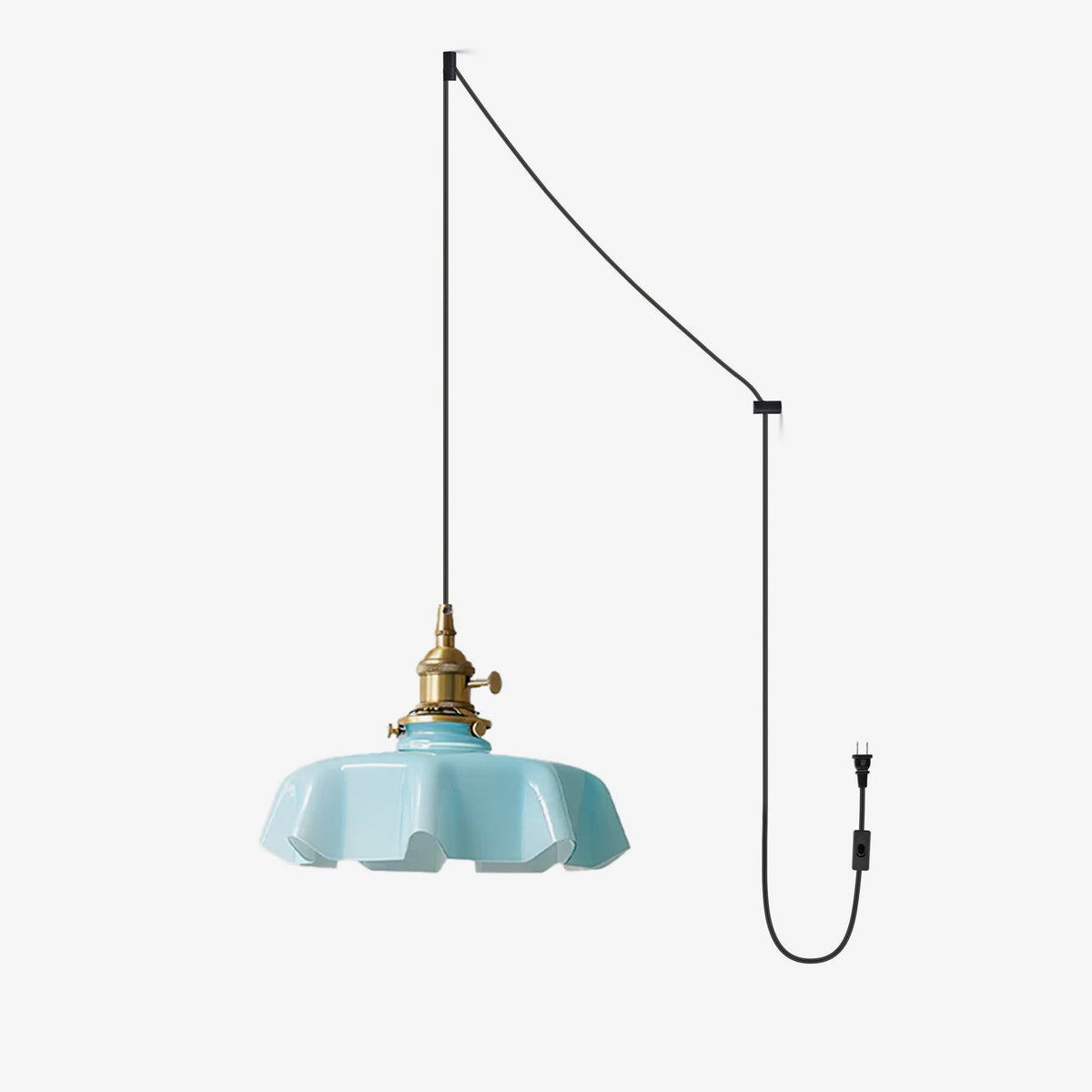 This Clérachic pendant's plug-in diagram routes a black cord from ceiling hook to wall plug, ending in the blue pleated shade.