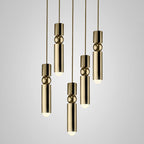Geometric pendant light cluster glowing in a living space