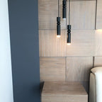 Geometric pendant light cluster in a black metal finish