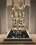 Geometric pendant light cluster casting an architectural glow