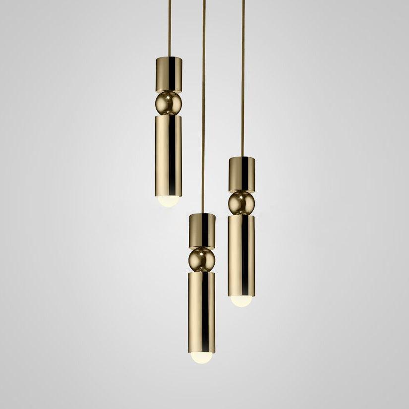 Cylinder cluster pendant light casting warm light from above