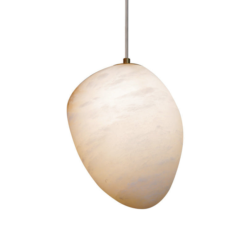 Slim teardrop alabaster shade hung from a long stem, unlit against a white background