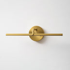 This gold-finish Clérachic wall light shown unlit on a plain wall, the bar centred through the canopy with the pivot arm visible above.