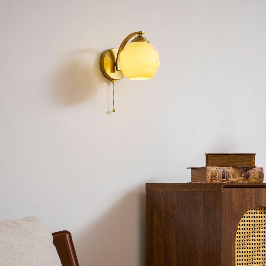 Gatsby wall lamp with rounded glass shade close up detail