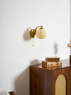 Gatsby wall lamp showing slim backplate and glass shade