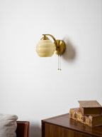 Gatsby wall lamp mounted on a neutral interior wall