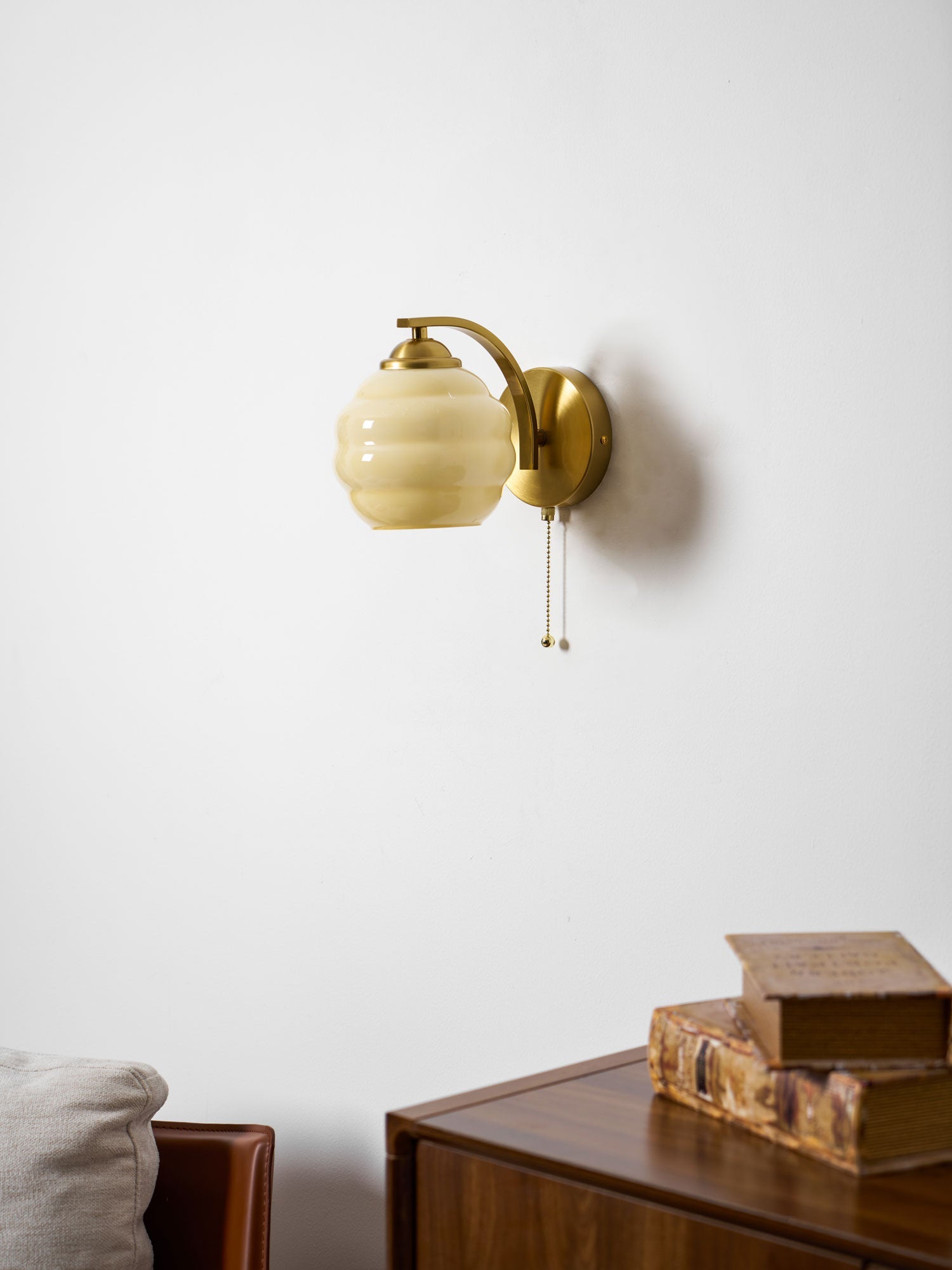 Gatsby wall lamp mounted on a neutral interior wall