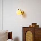 Gatsby wall lamp with glass shade and gold toned finish