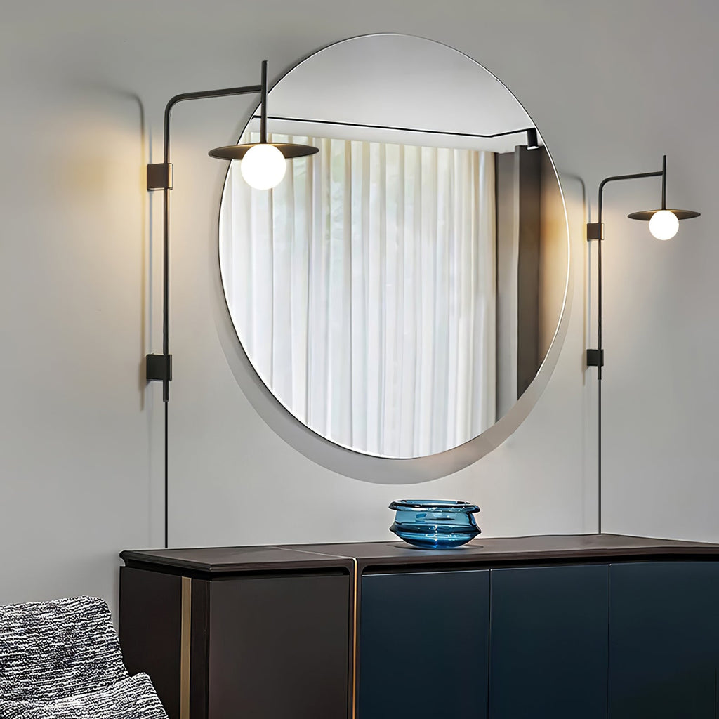 Swing arm wall lamp with iron frame and frosted glass shade