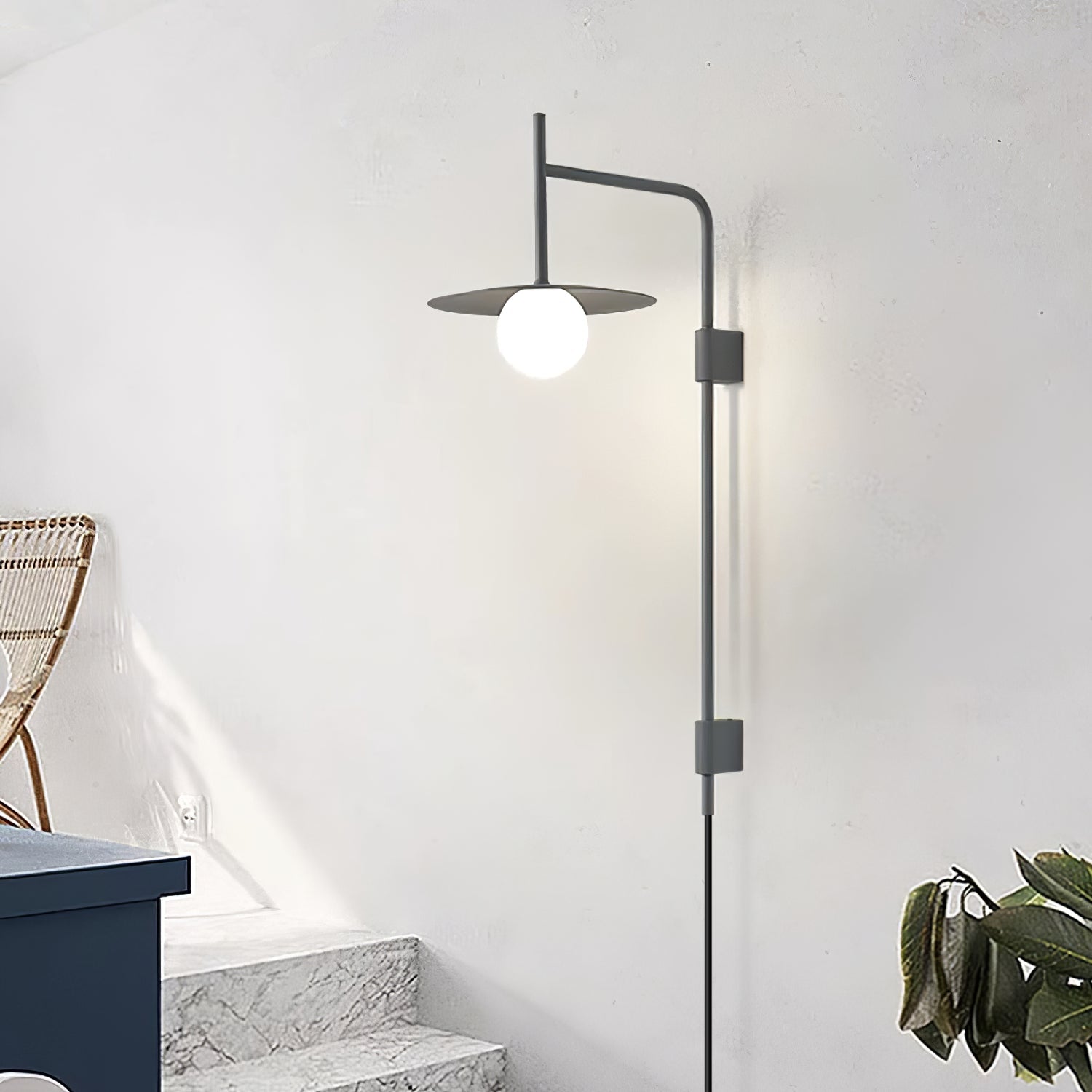 Swing arm wall lamp with frosted glass shade close up detail