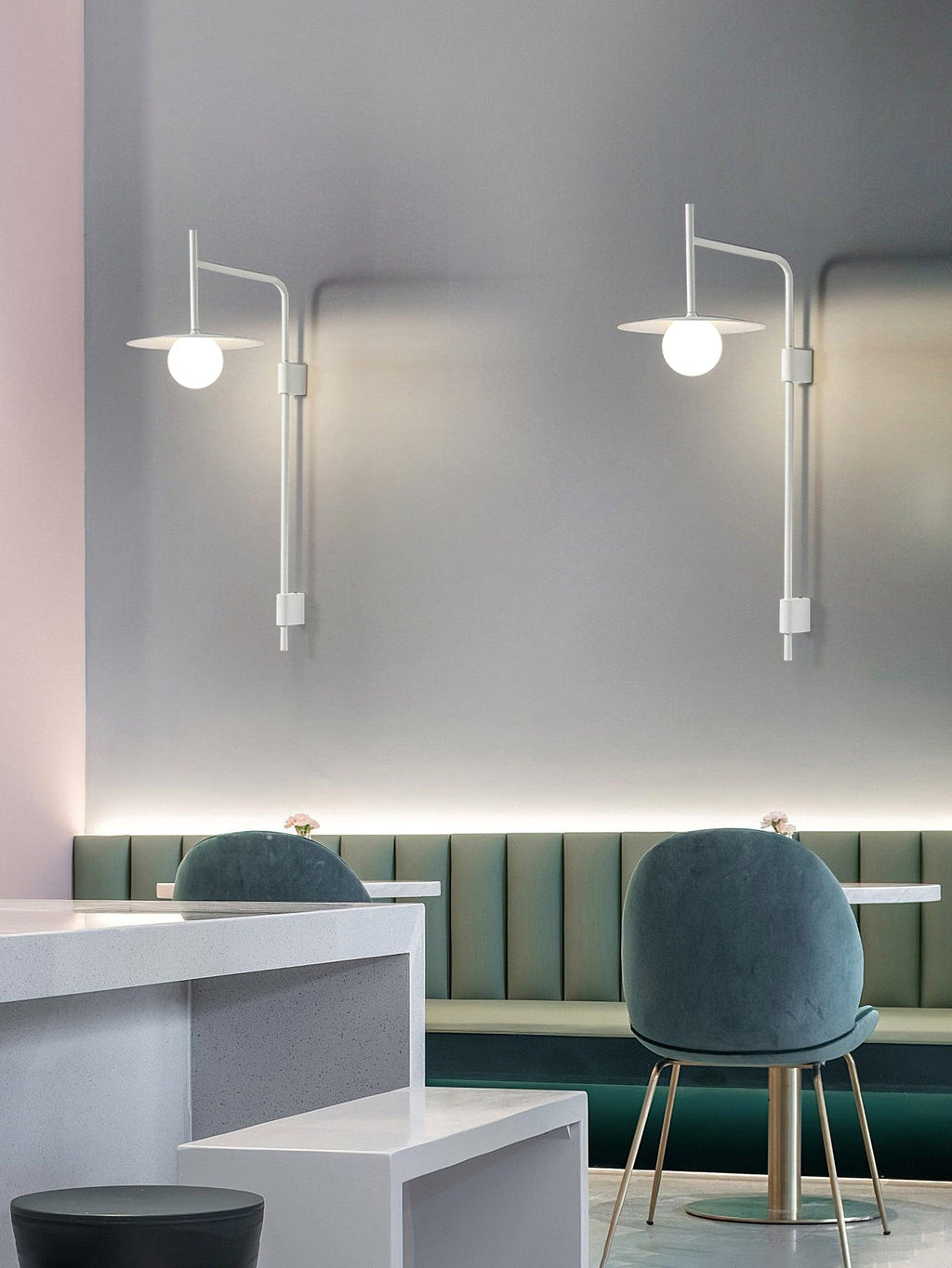 Swing arm wall lamp with frosted glass shade and iron detail