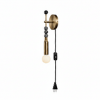Clérachic wall light on white, rounder dark beads stacked above a lit glass globe, cord and plug hanging below.