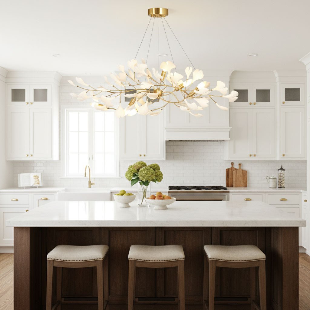 Ginkgo bough chandelier glowing softly over an island counter