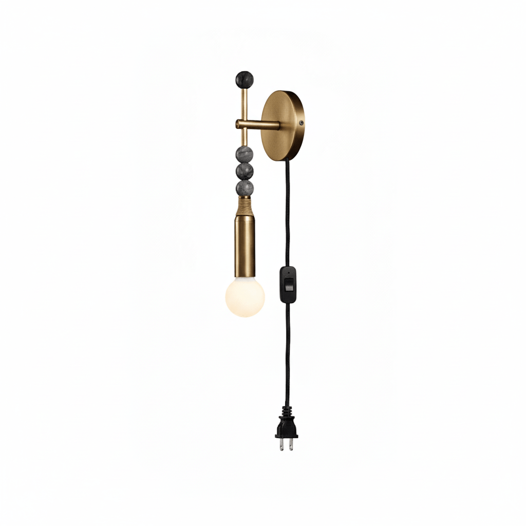 Clérachic plug-in wall lamp on white, dark stone beads above a lit globe, cord running to an inline switch and plug.