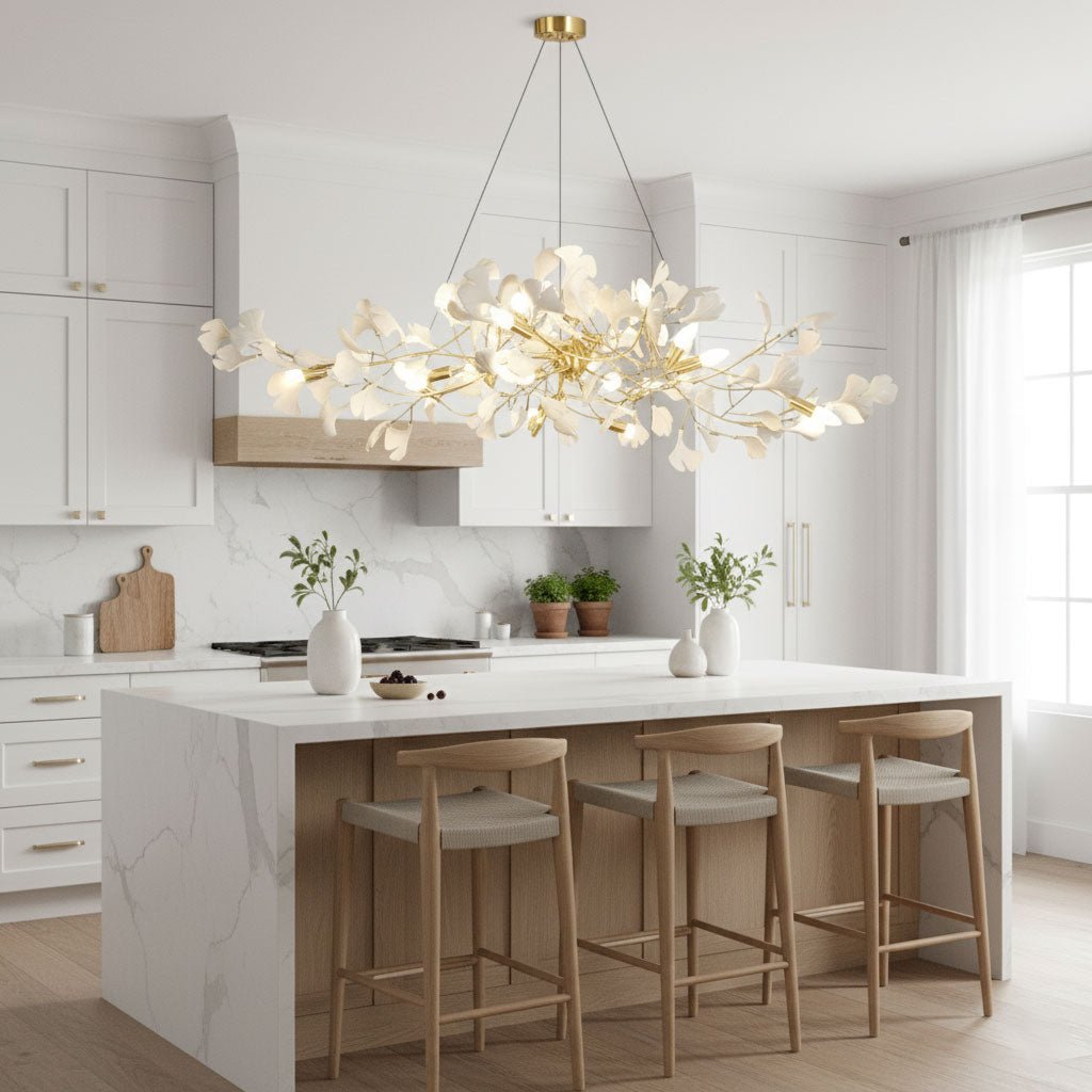 White porcelain ginkgo leaves on brass branches, warm glow