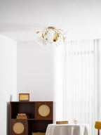 Ginkgo leaf ceiling fixture casting warm light overhead