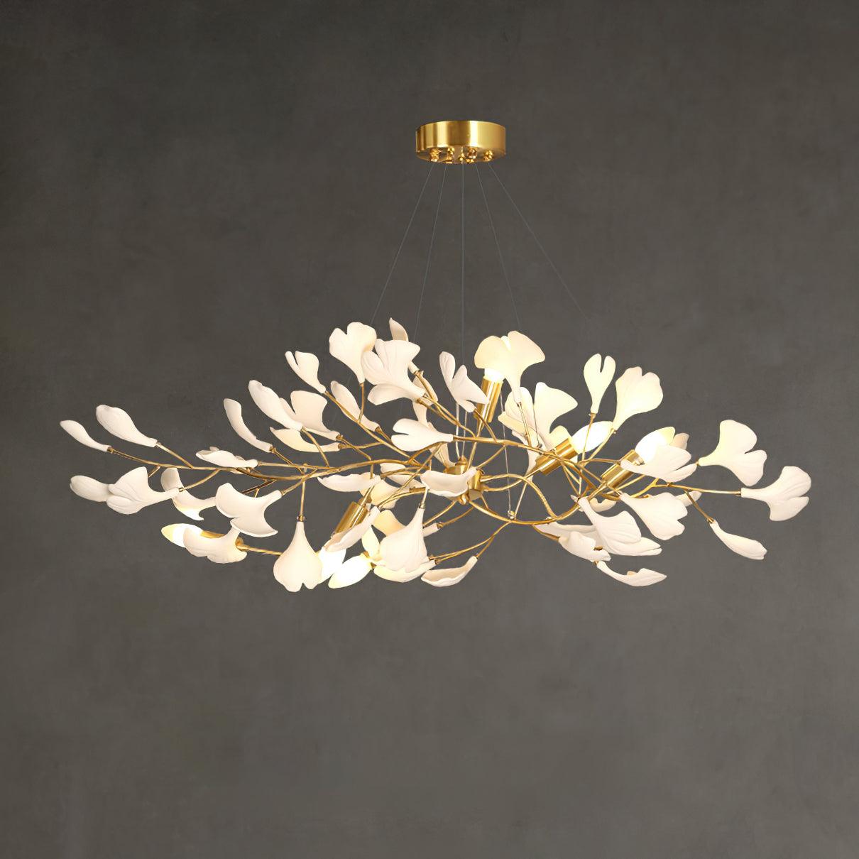 Detail of porcelain ginkgo leaves along a brass branch