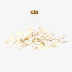 Linear porcelain ginkgo chandelier on a clean backdrop