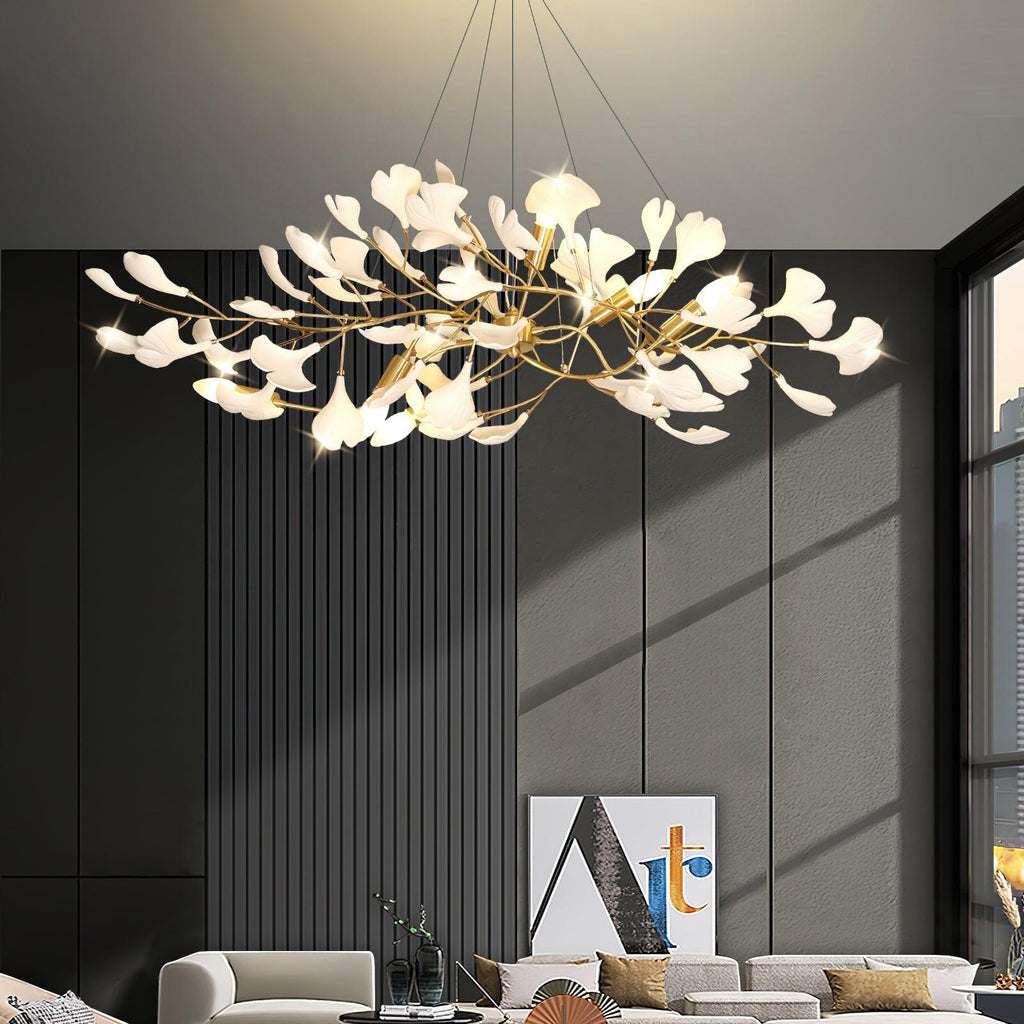 Linear ginkgo chandelier with brass branches and porcelain leaves