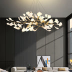 Linear ginkgo chandelier with brass branches and porcelain leaves
