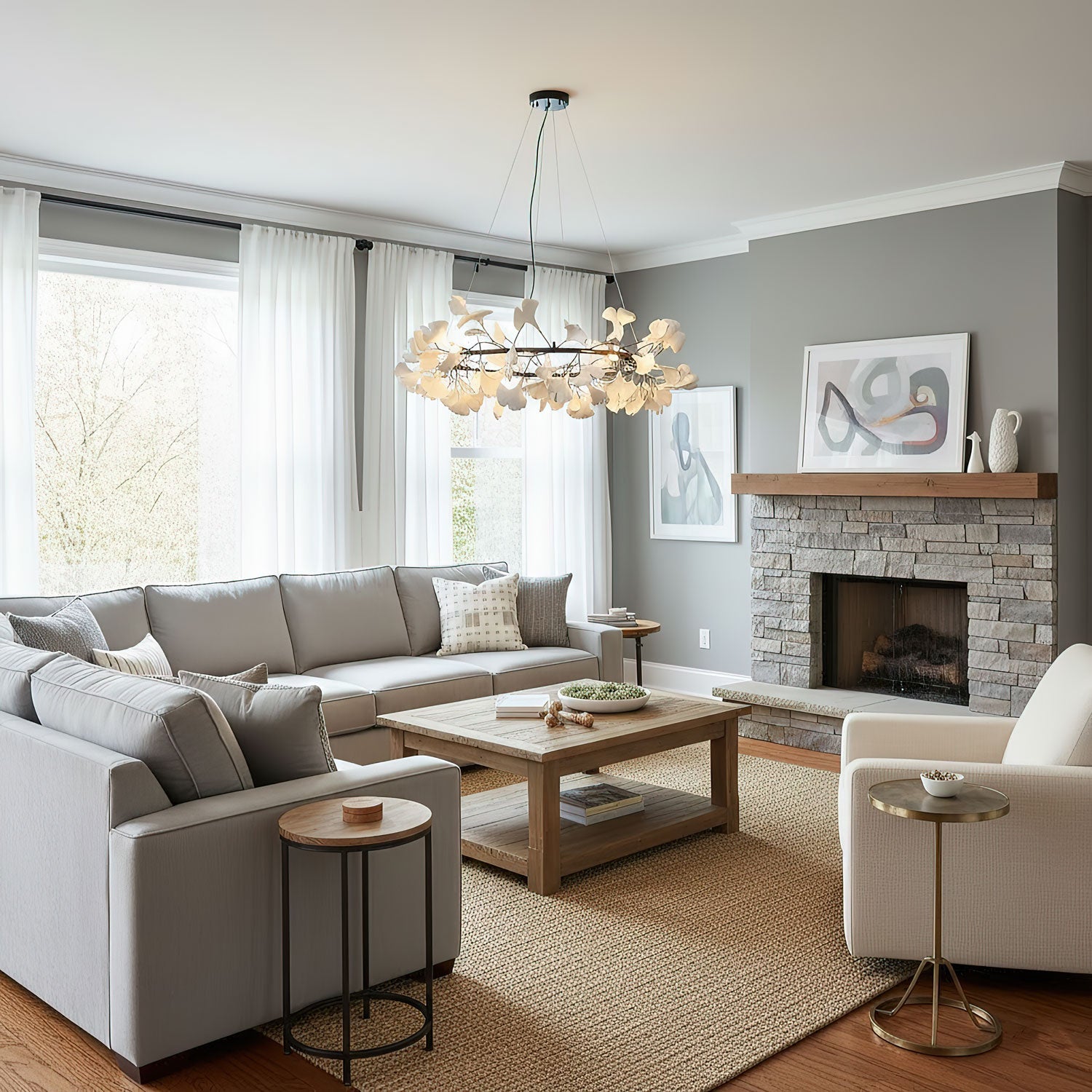 Porcelain ginkgo chandelier lit above a calm dining setting
