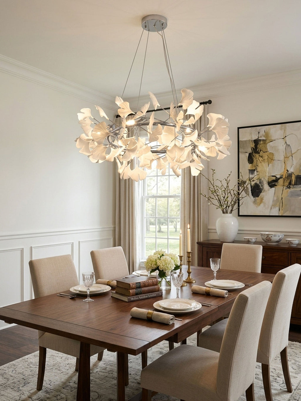 Crown chandelier with white porcelain ginkgo leaves lit warm