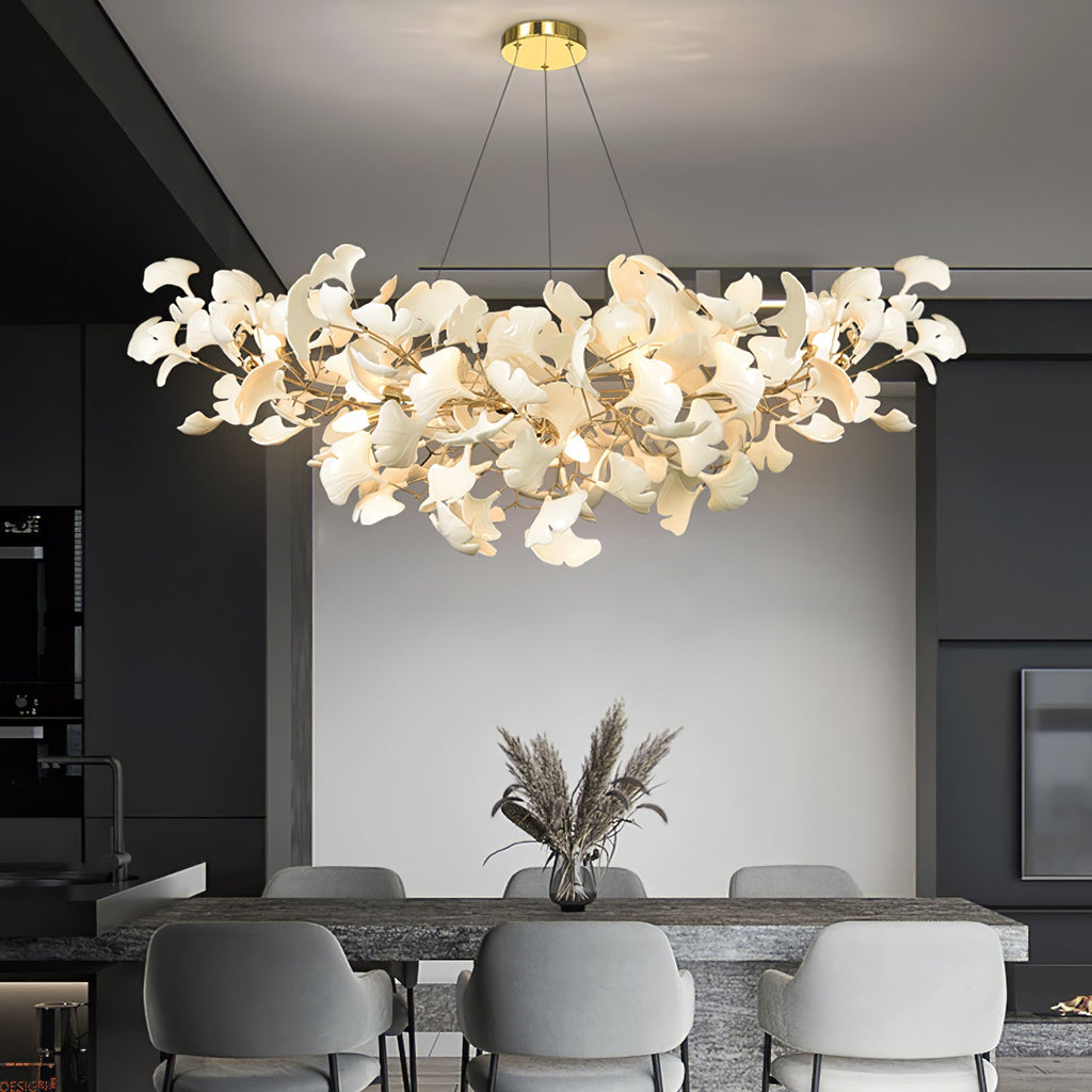 Porcelain gingko chandelier shown spread across a grand ceiling
