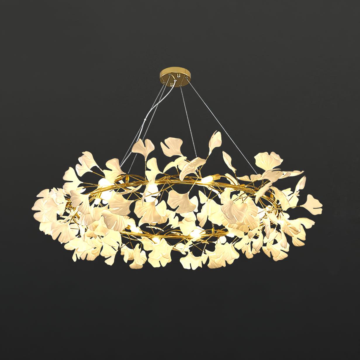 Brass crown chandelier with porcelain ginkgo leaves from below