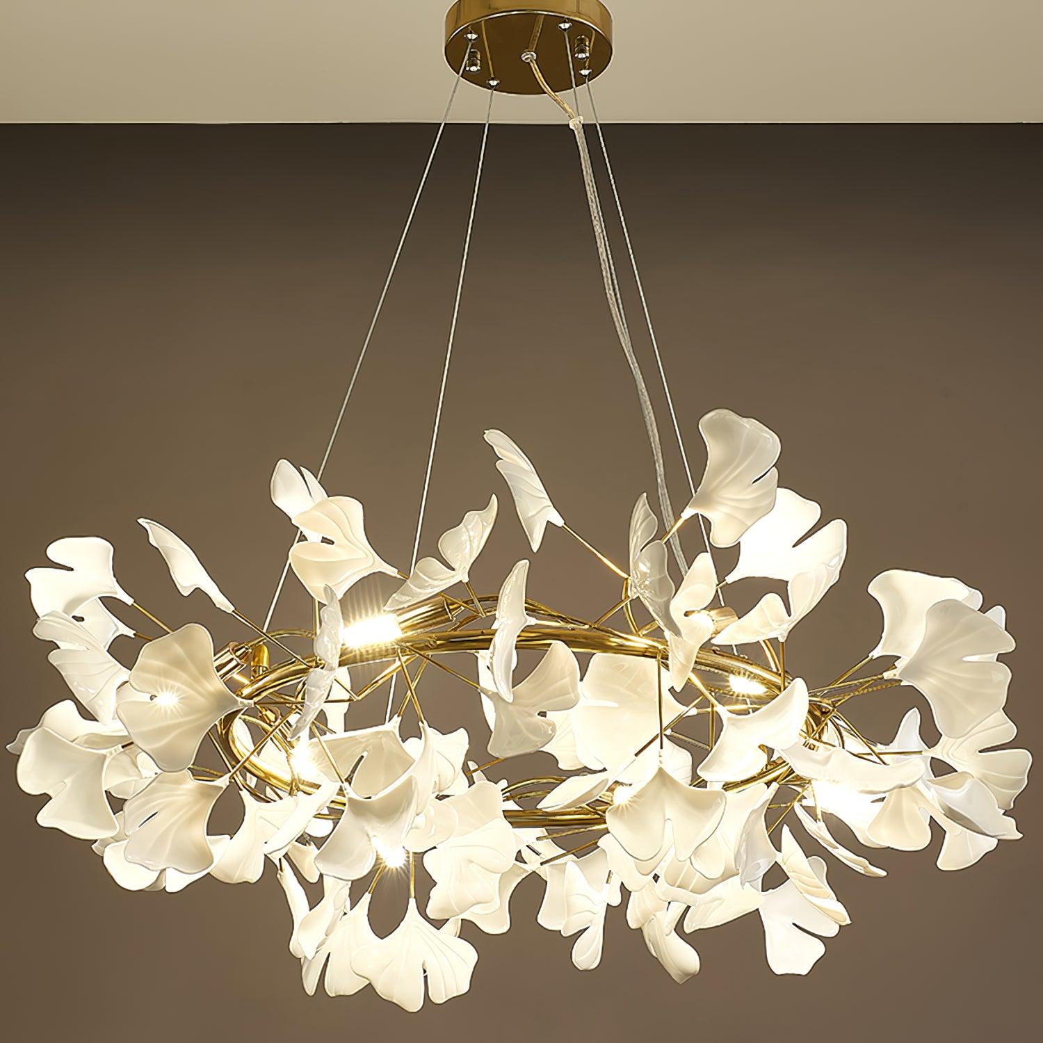 Detail of porcelain ginkgo leaves on a glowing brass ring