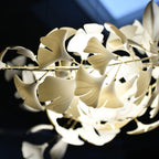Ginkgo leaf chandelier suspended over an island counter